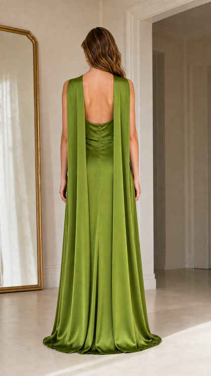 Back view showing flowing drape panels on olive green maxi dress