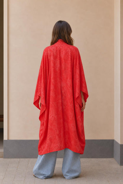 Back view of model in red long kimono cardigan