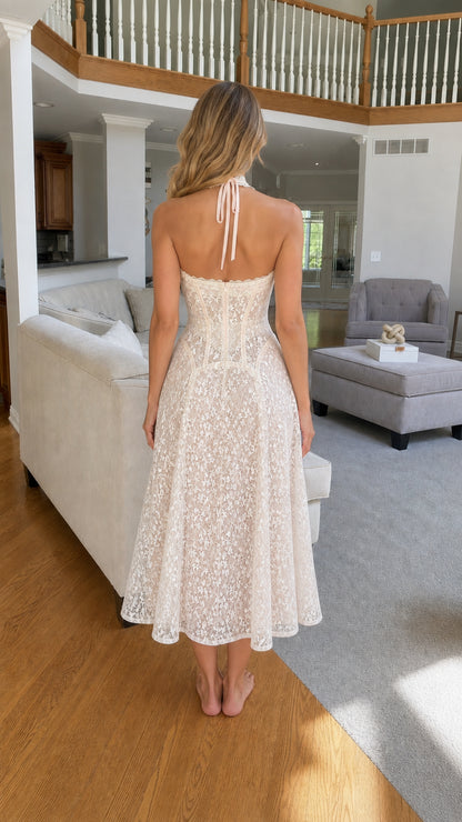 Back view of white lace halter midi dress