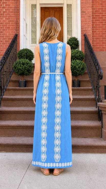Back view of blue maxi dress highlighting vertical embroidery details