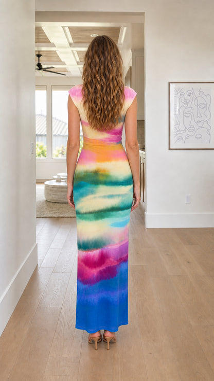 Back view of woman in Rainbow tie-dye maxi dress