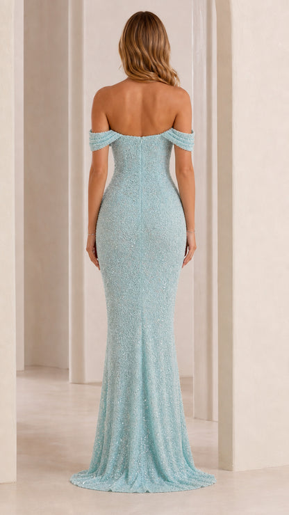 Back view of model in light blue off-shoulder gown
