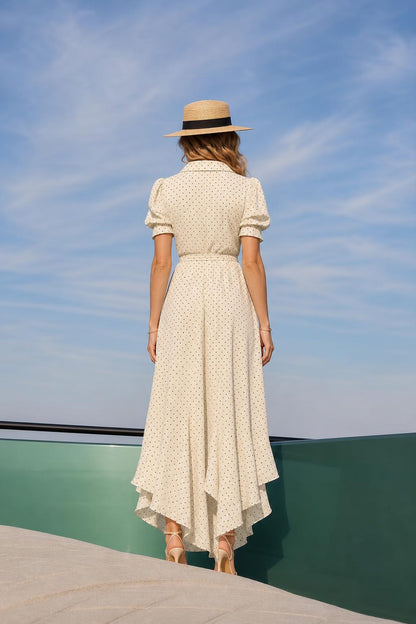 Back view of cream polka dot maxi dress