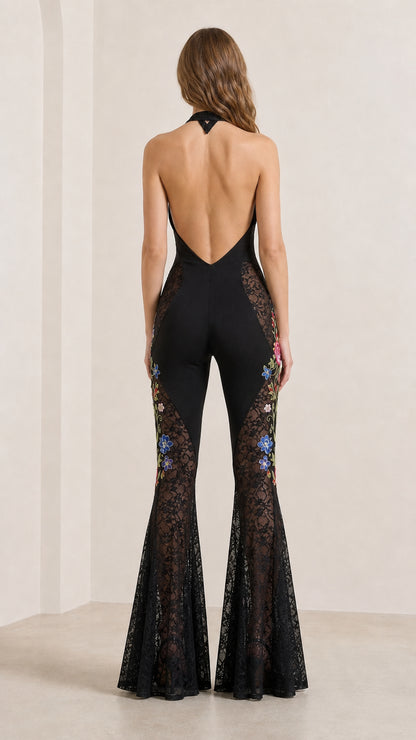 Back view showing open back design of the jumpsuit