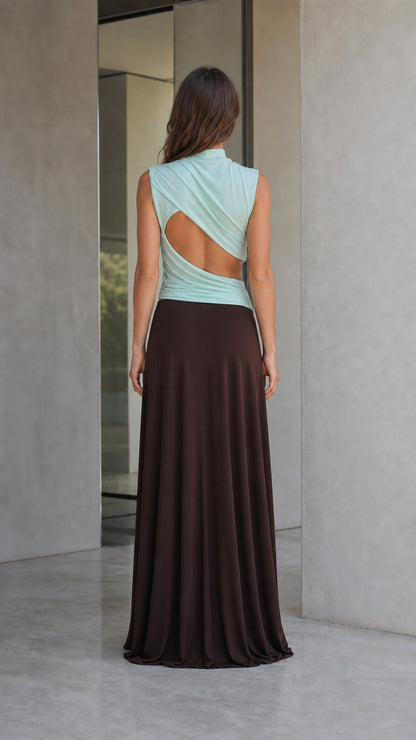 Back view highlighting open-back cutout on mint top