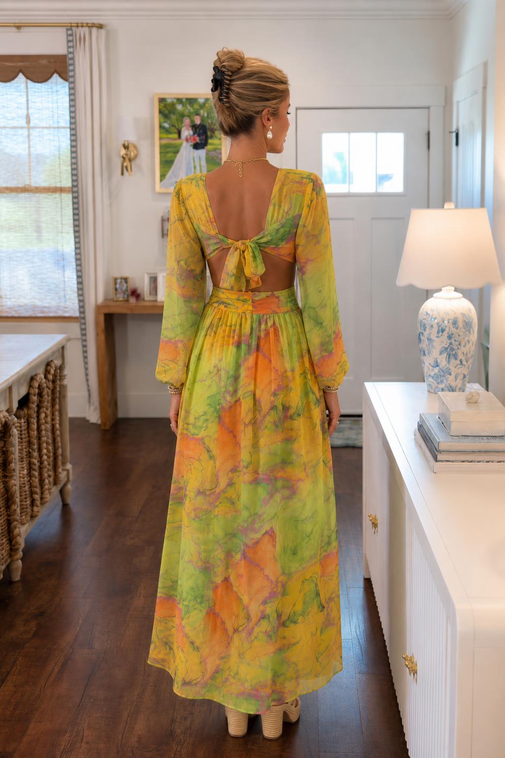 Back view of model showcasing open back and tie detail
