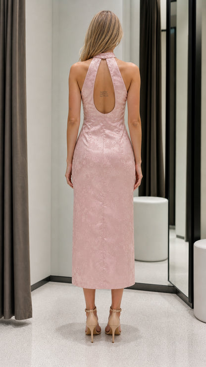 Back view of pink halter dress showing keyhole detail