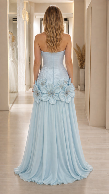 Back view of light blue strapless evening gown