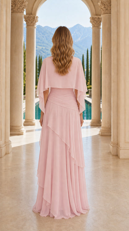 Back view of pink formal dress with capelet