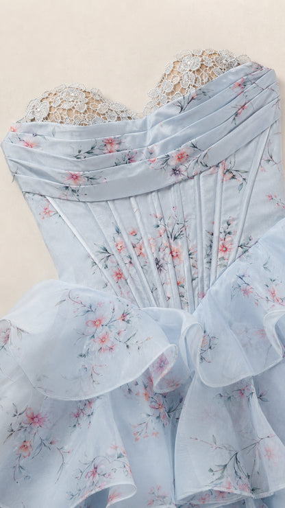 Close-up detail of lace-trimmed sweetheart neckline and boned corset bodice