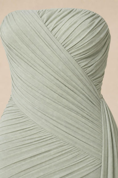 Close-up detail of front bodice ruching and draping in sage green