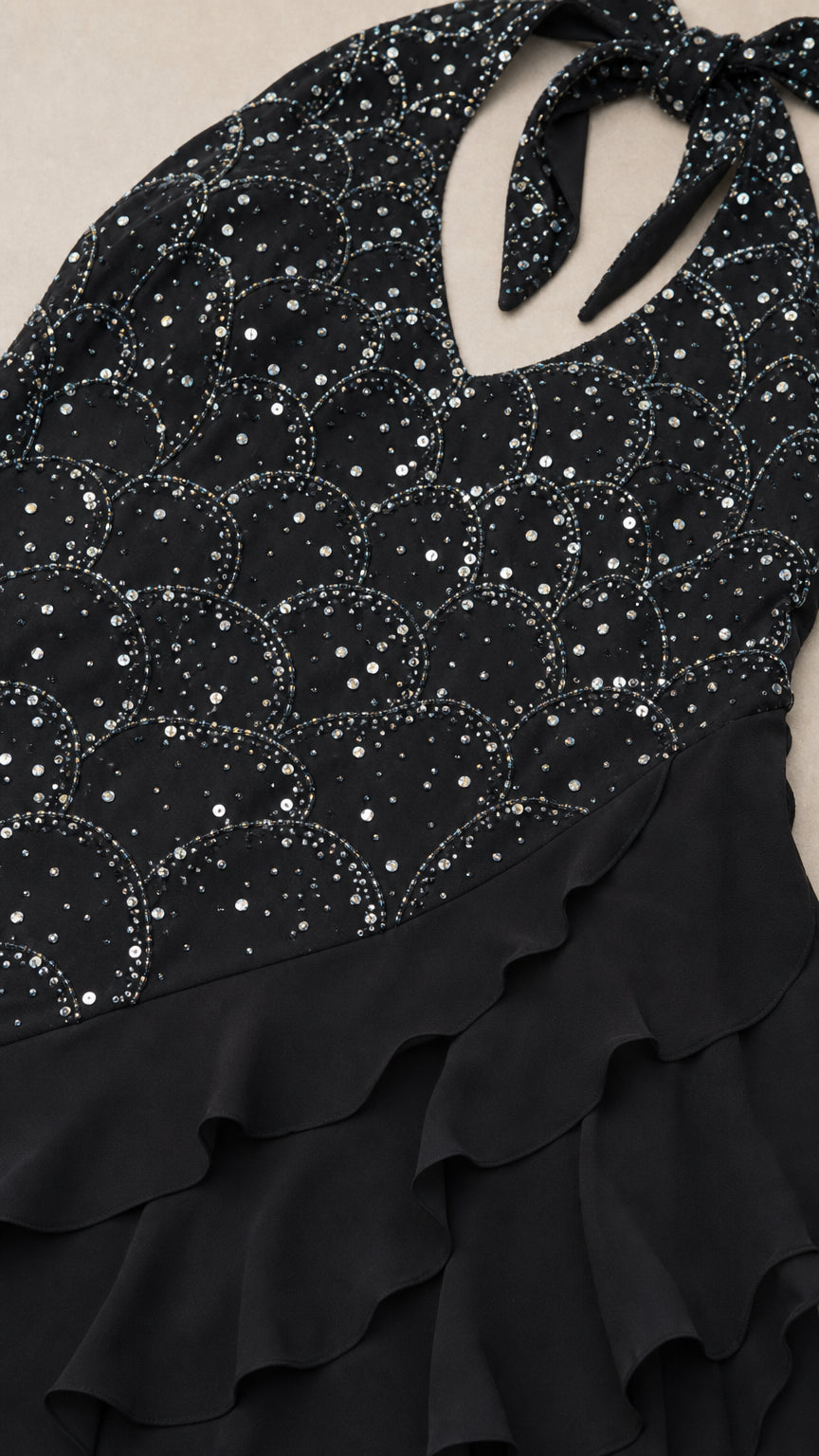 Close up of sequin and rhinestone pattern on bodice