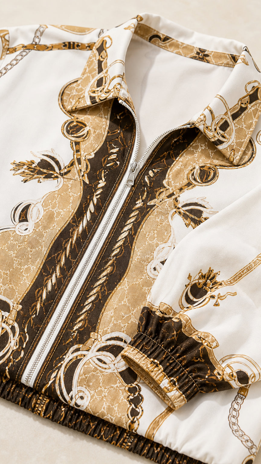 Close-up detail of zip-front top collar and fabric pattern