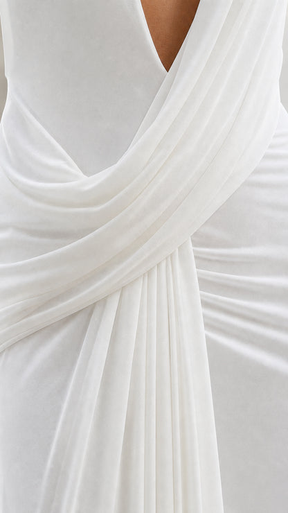 Close-up detail of the waist draping and plunging neckline