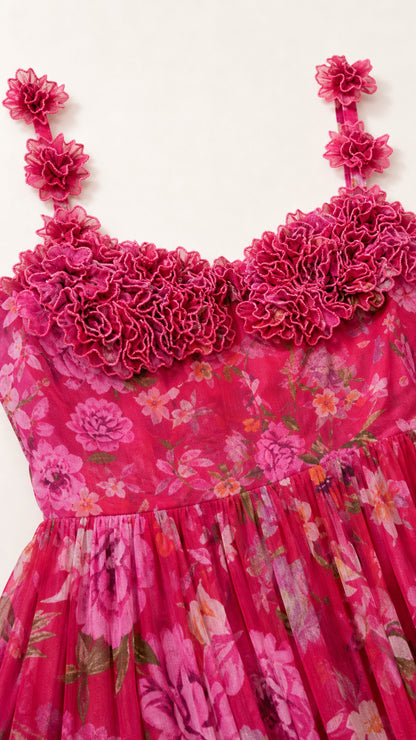 Close-up of floral ruffle applique and neckline