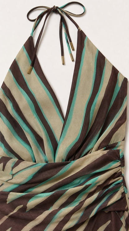 Close-up of halter neck ties and striped fabric pattern