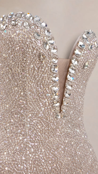 Close-up of crystal embellished plunging neckline