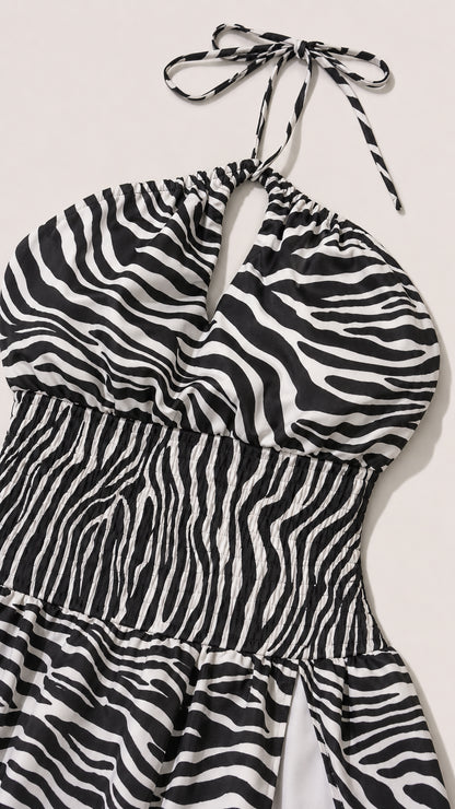 Close up of bodice and halter tie detail of zebra print dress