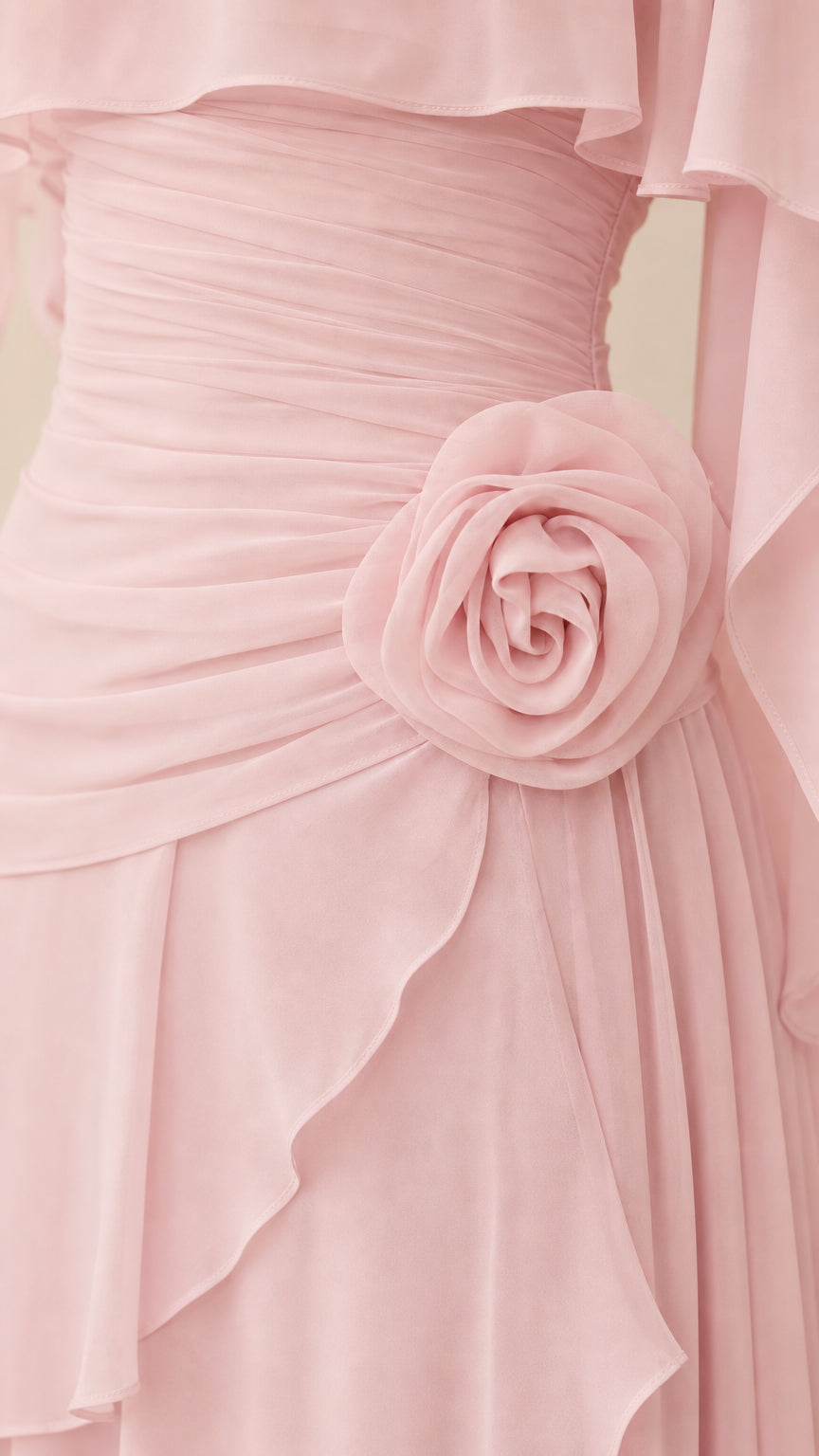 Close-up of ruched bodice and rosette waist detail