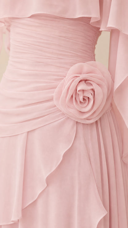Close-up of ruched bodice and rosette waist detail