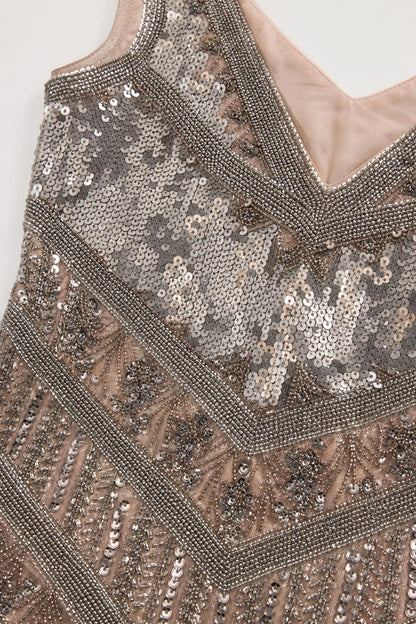 Close-up detail of the silver sequin and bead pattern