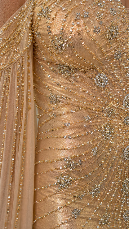 Close-up detail of beadwork and sequins on the dress