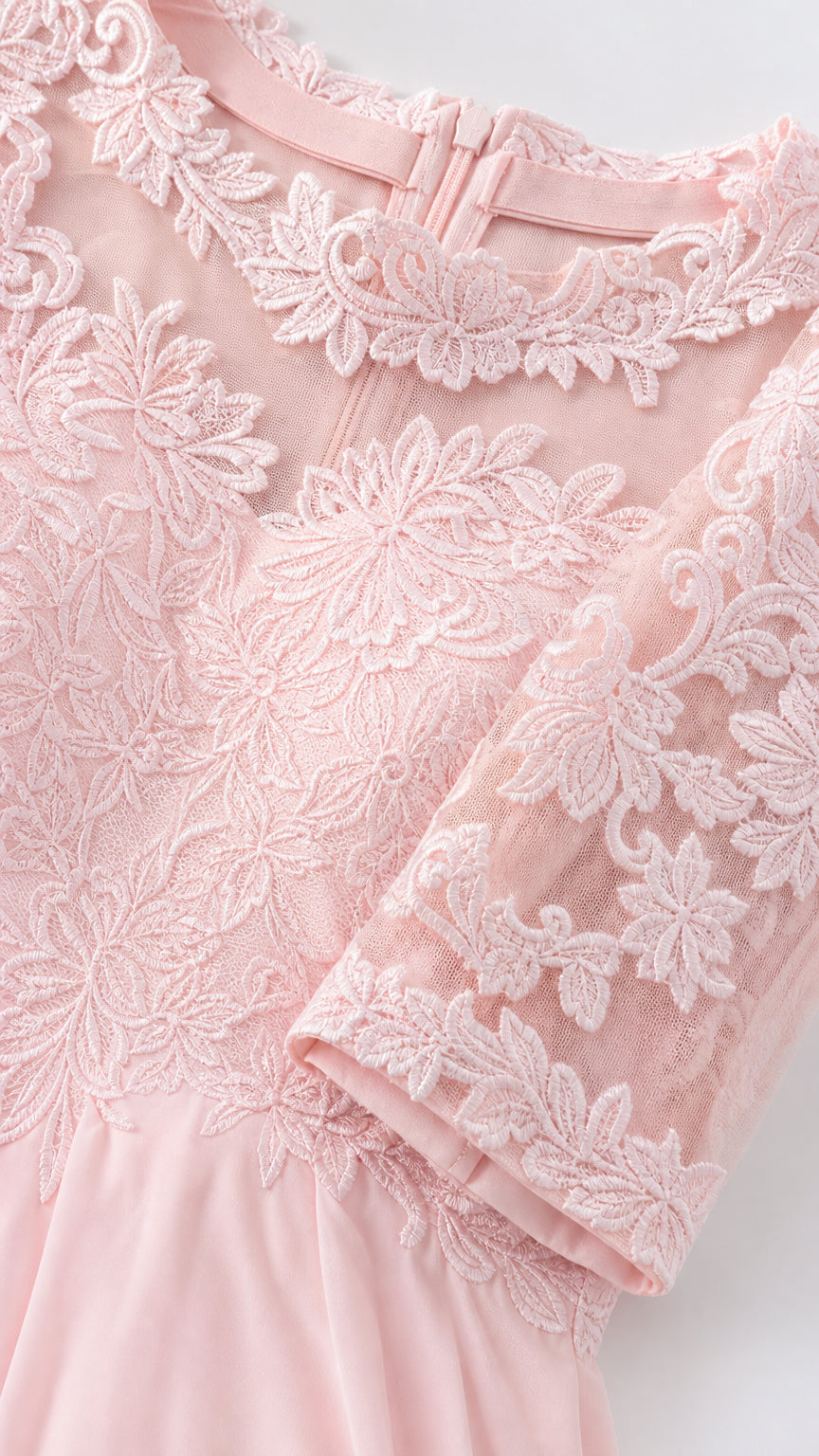 Close-up detail of lace bodice and sleeves