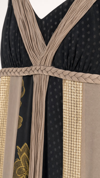 Close-up detail of pleated bodice and braided waist on maxi dress