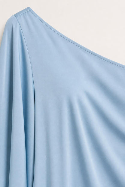 Close-up of light blue smooth fabric texture
