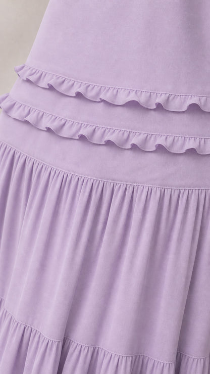 Close-up detail of ruffle tiers and fabric texture