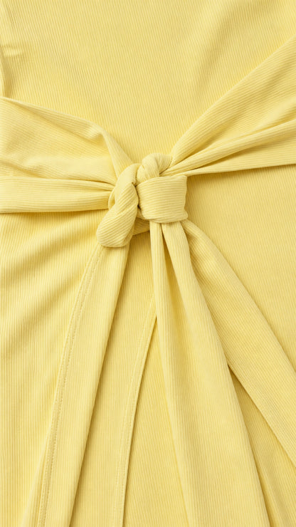 Close-up detail of the ribbed texture and front tie knot