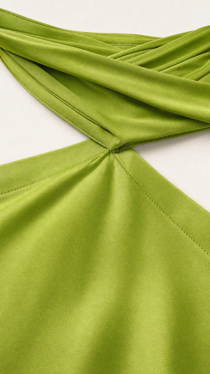 Close-up detail of the halter neckline and shoulder straps
