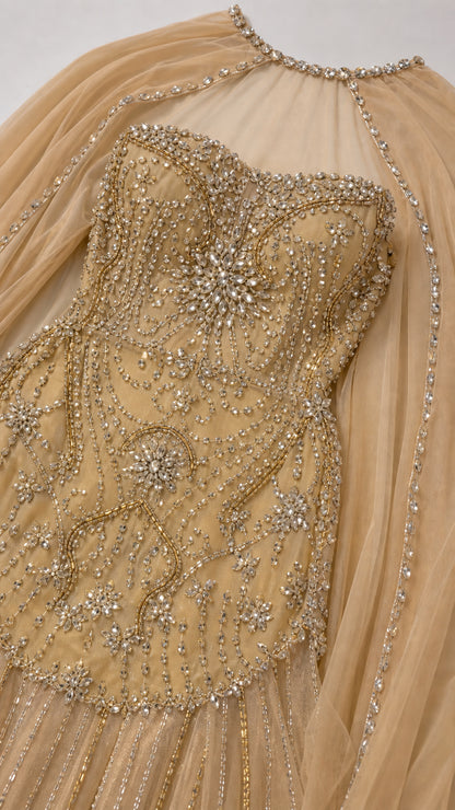 Close-up detail of bodice beadwork and rhinestone neckline