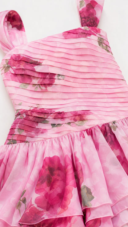 Close-up detail of pleated bodice and floral fabric