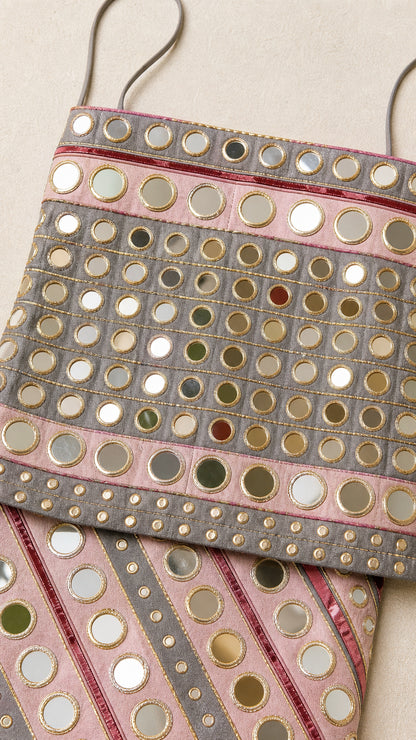 Close-up detail of the mirrored sequin fabric and texture