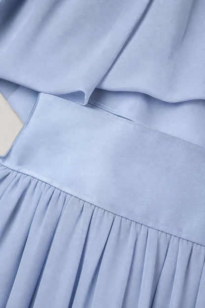 Close up of light blue fabric texture and waistband