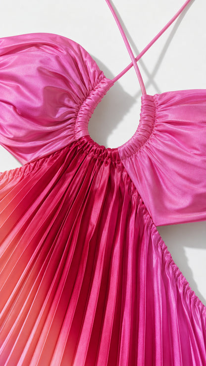 Close-up detail of gathered halter neckline and cutout on pink dress