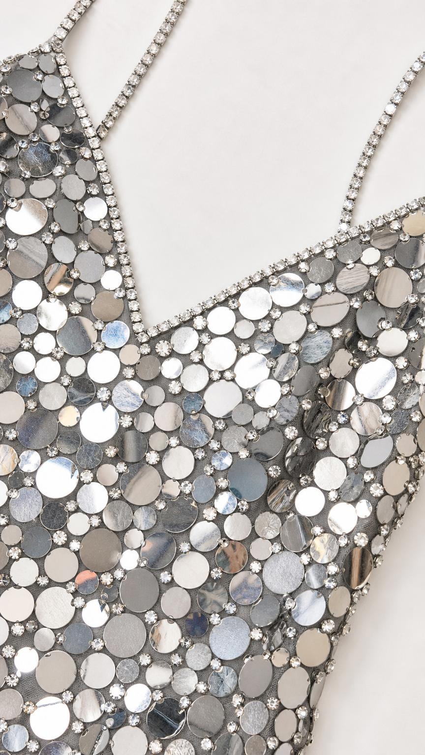 Close-up of mirrored sequin pattern and rhinestone straps