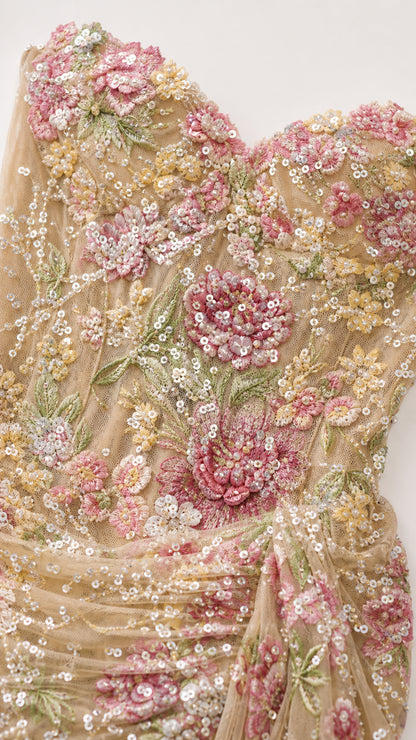Close-up detail of sequin and floral beadwork