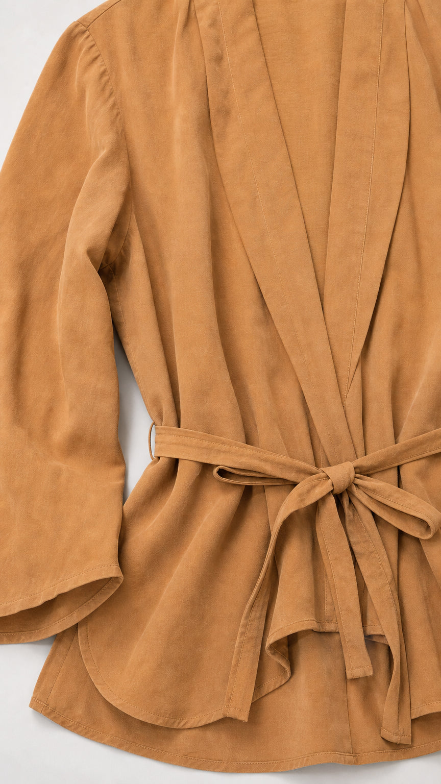 Close up of camel belted tunic fabric and details