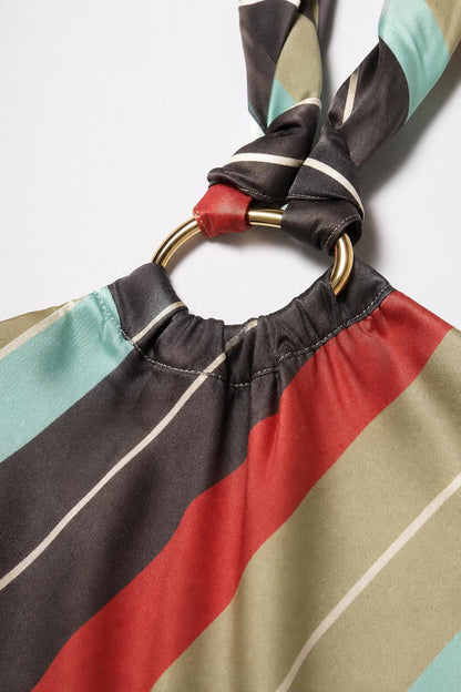 Close-up detail of metal ring and fabric texture