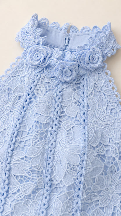 Close-up of light blue halter neckline and 3D floral lace details