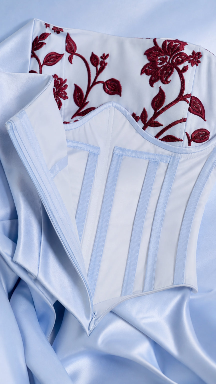 Close-up of the structured bodice and floral neckline detailing