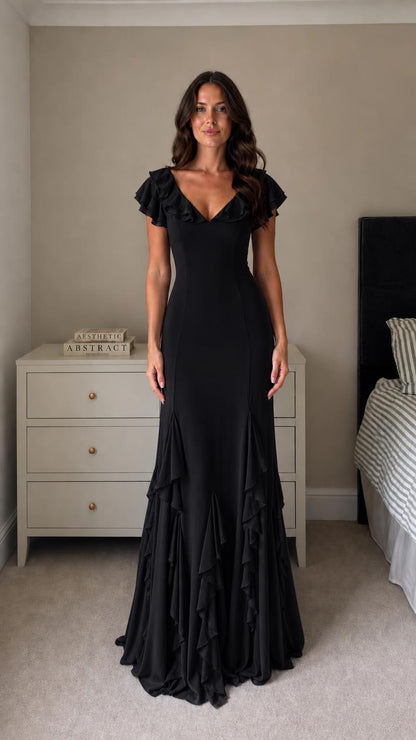 Front view of model wearing Black formal evening gown