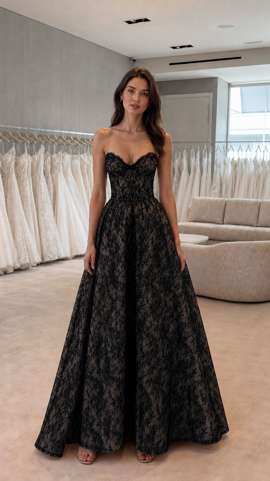 Front view of black strapless lace evening gown
