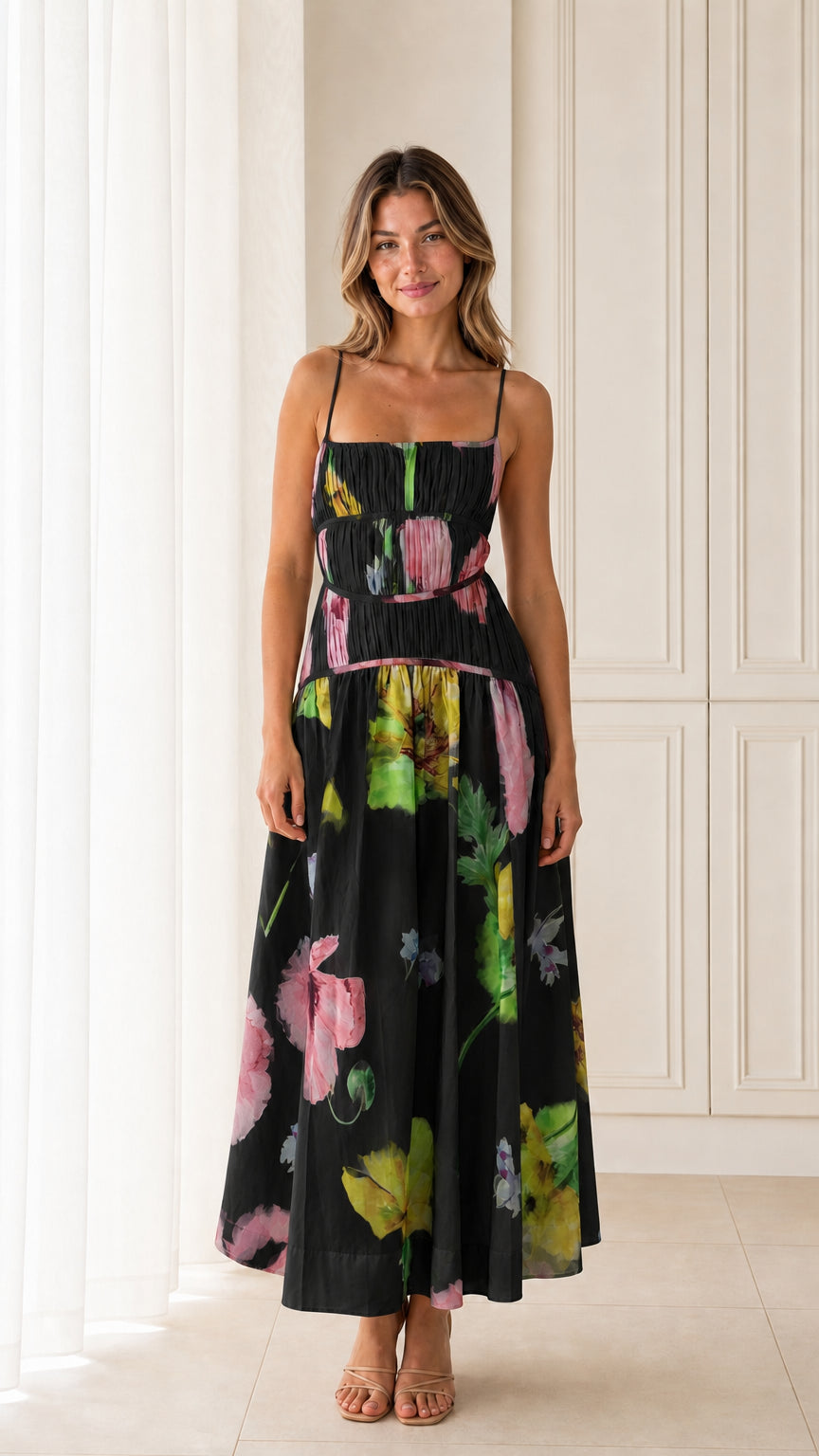 Front view of model wearing Black floral smocked maxi dress