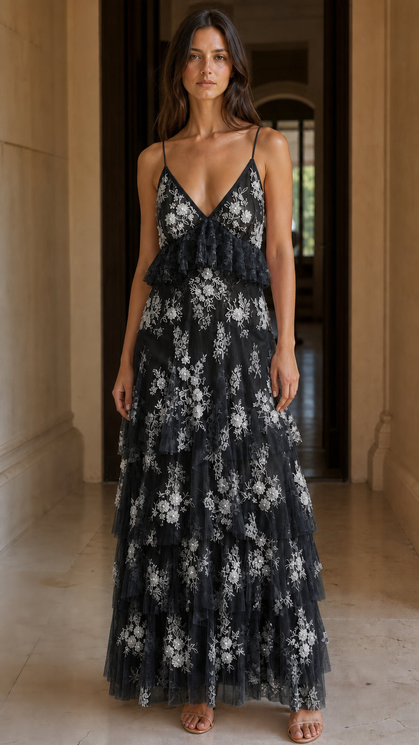 Front view of black embroidered tulle tiered maxi dress