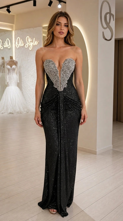 Front view of model wearing black strapless sequin evening dress