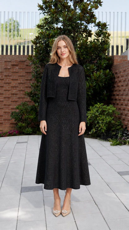 Full front view of model in black knit matching set