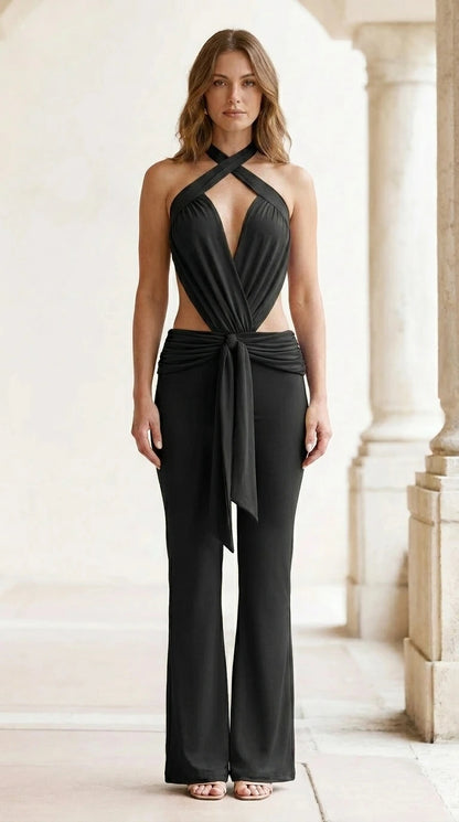 Front view of black halter neck cutout jumpsuit